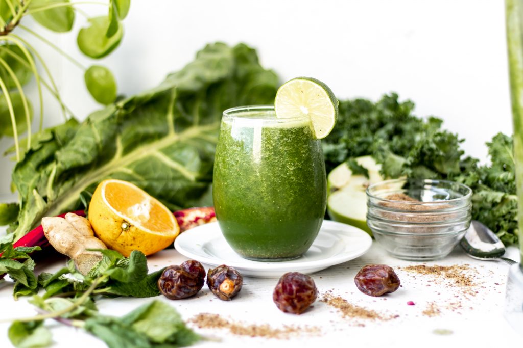 table of green smoothie with vegetables 