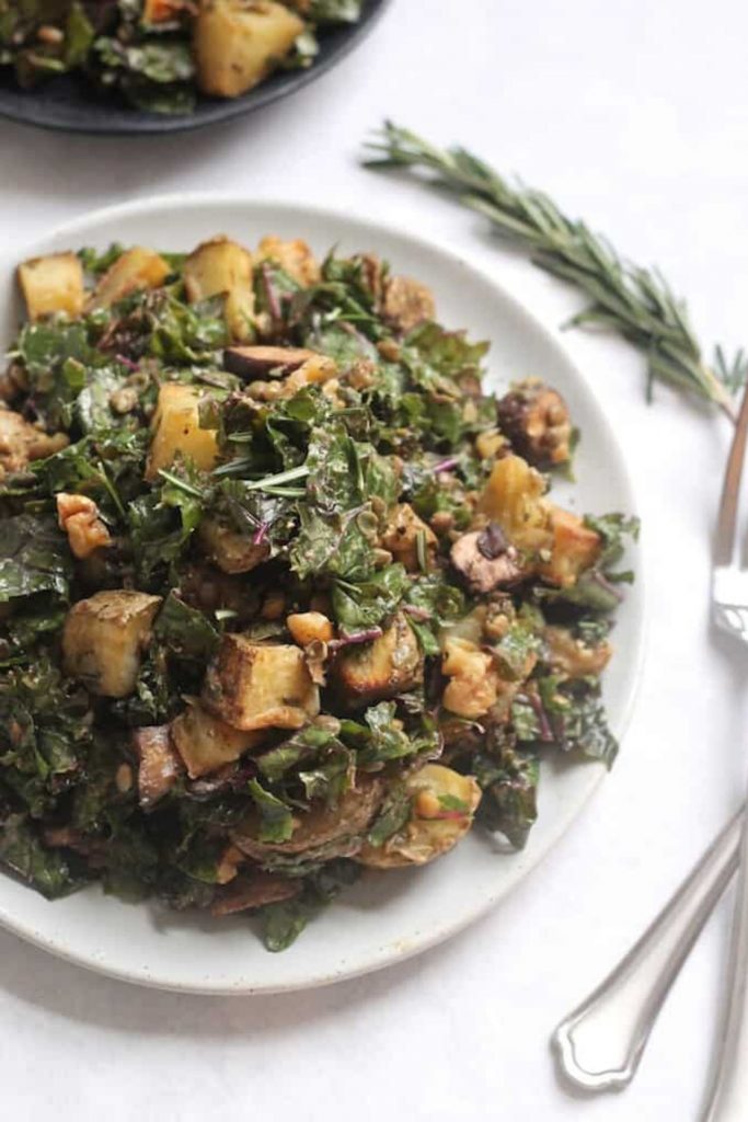 roasted potatoes in a kale salad