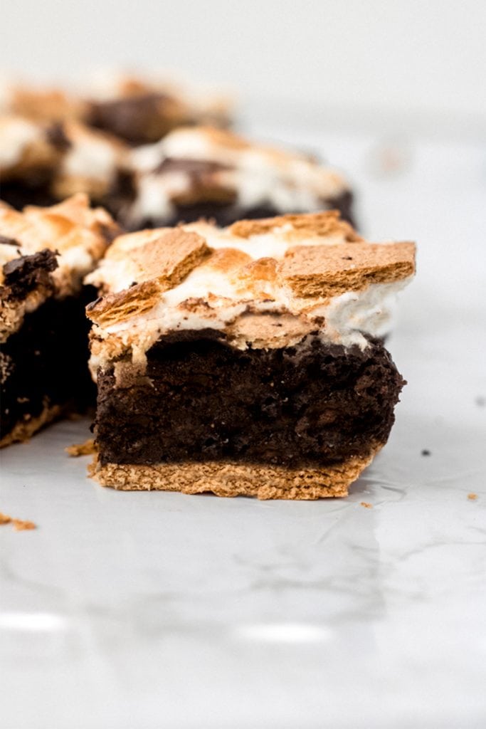 side view of vegan smores brownie one a white table