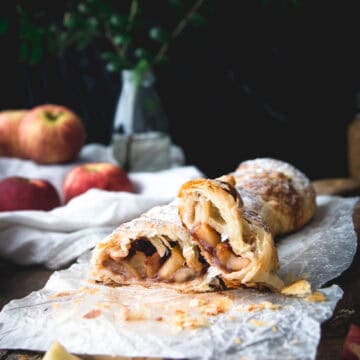 side view of two slices of puff pastry apple strudel