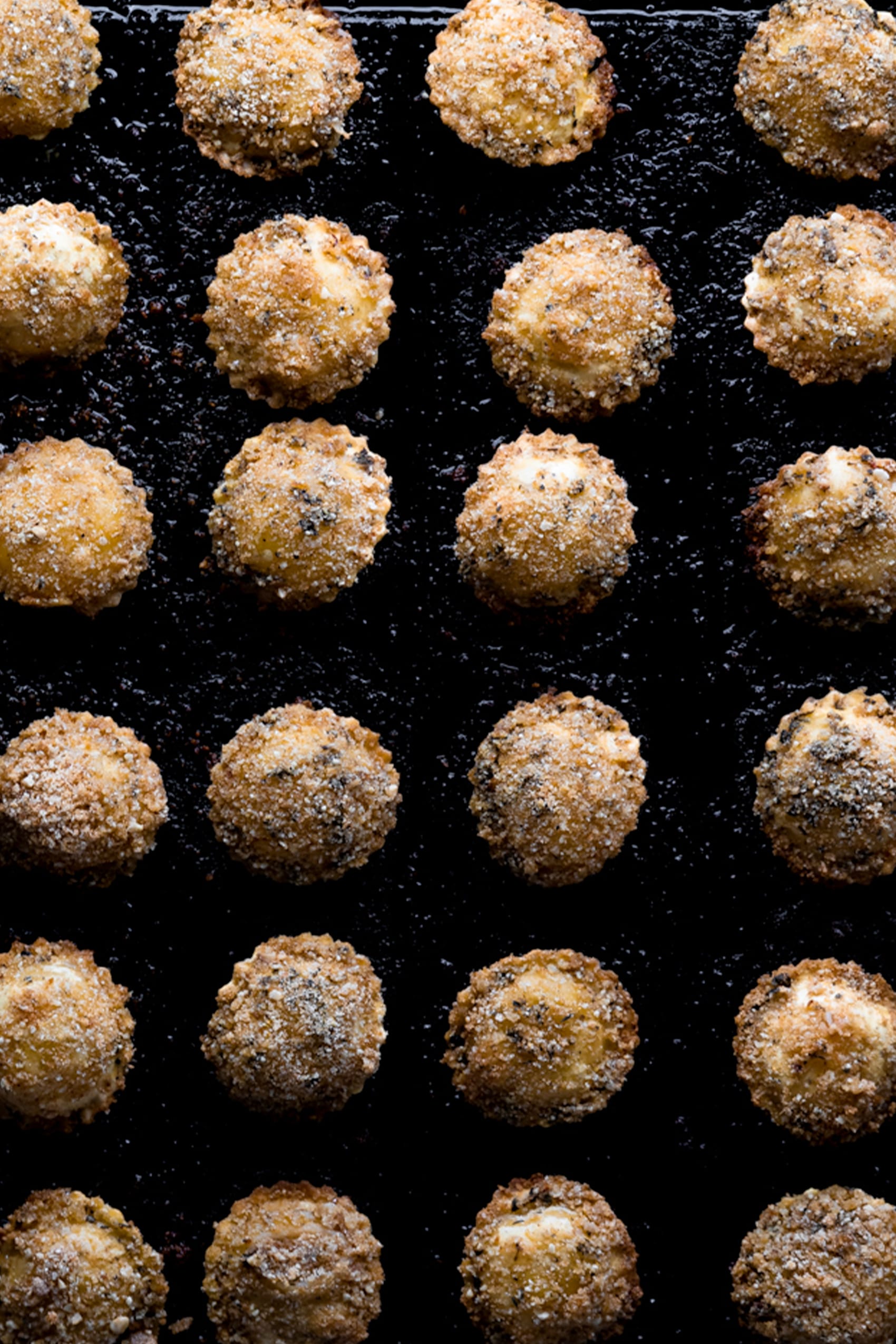 sheet tray of multiple crispy ravioli