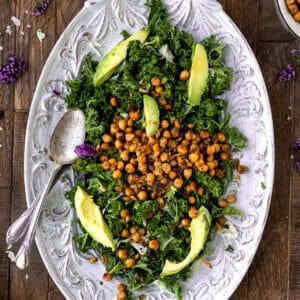 overhead shot of kale caesar salad with crispy chickpeas