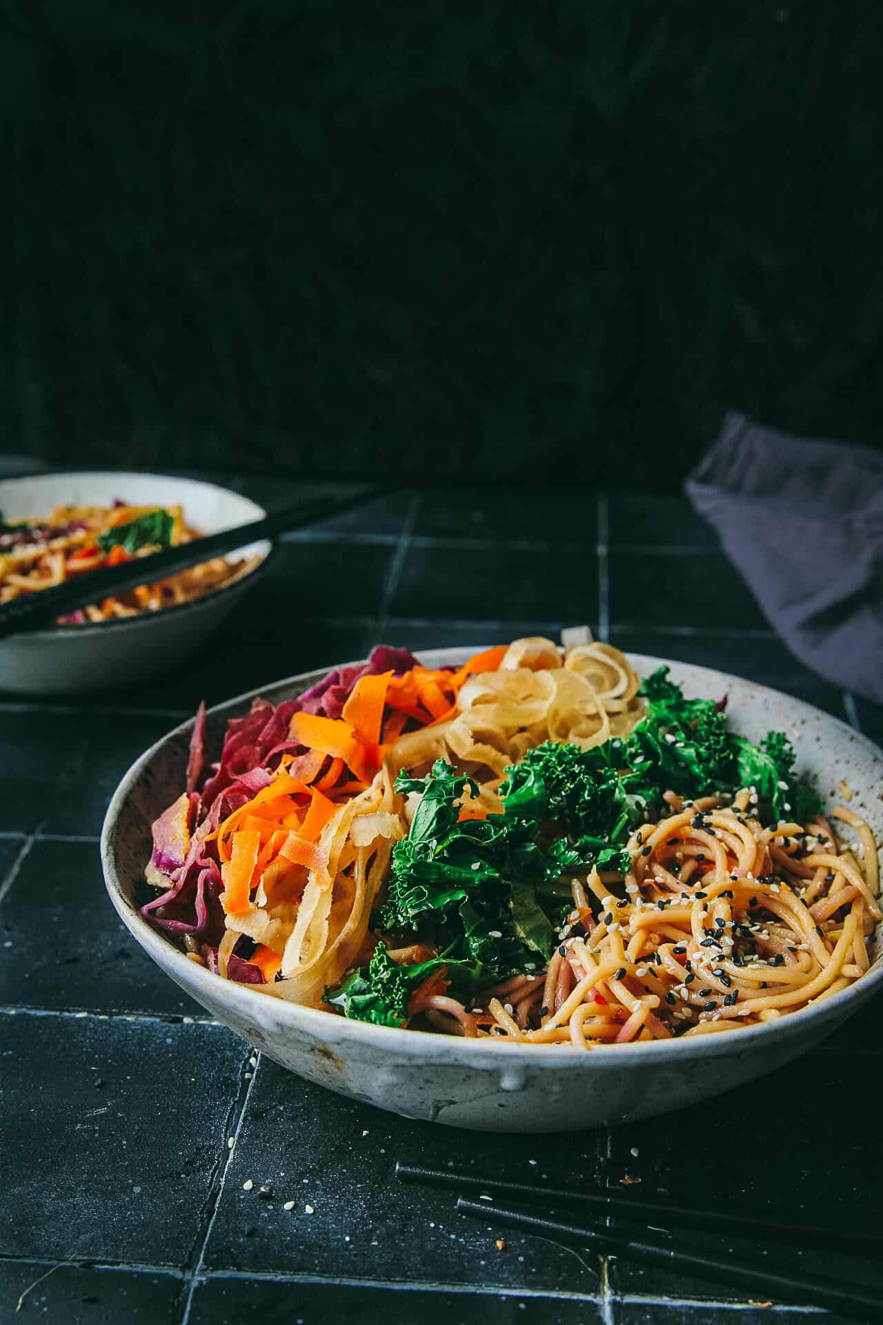 bowl of vegan sesame ginger noodles with vegetables