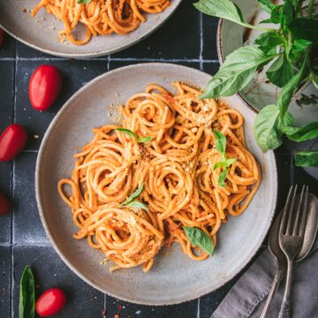 overhead shot of a plate of cherry tomato pasta alla vodka spaghetti