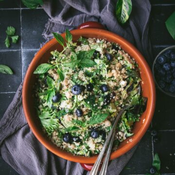 overhead shot of herby quinoa salad with tahini dressing