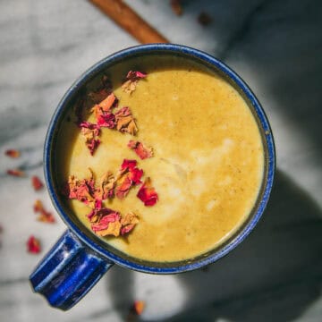 overhead shot of a mug of turmeric ginger sleep milk