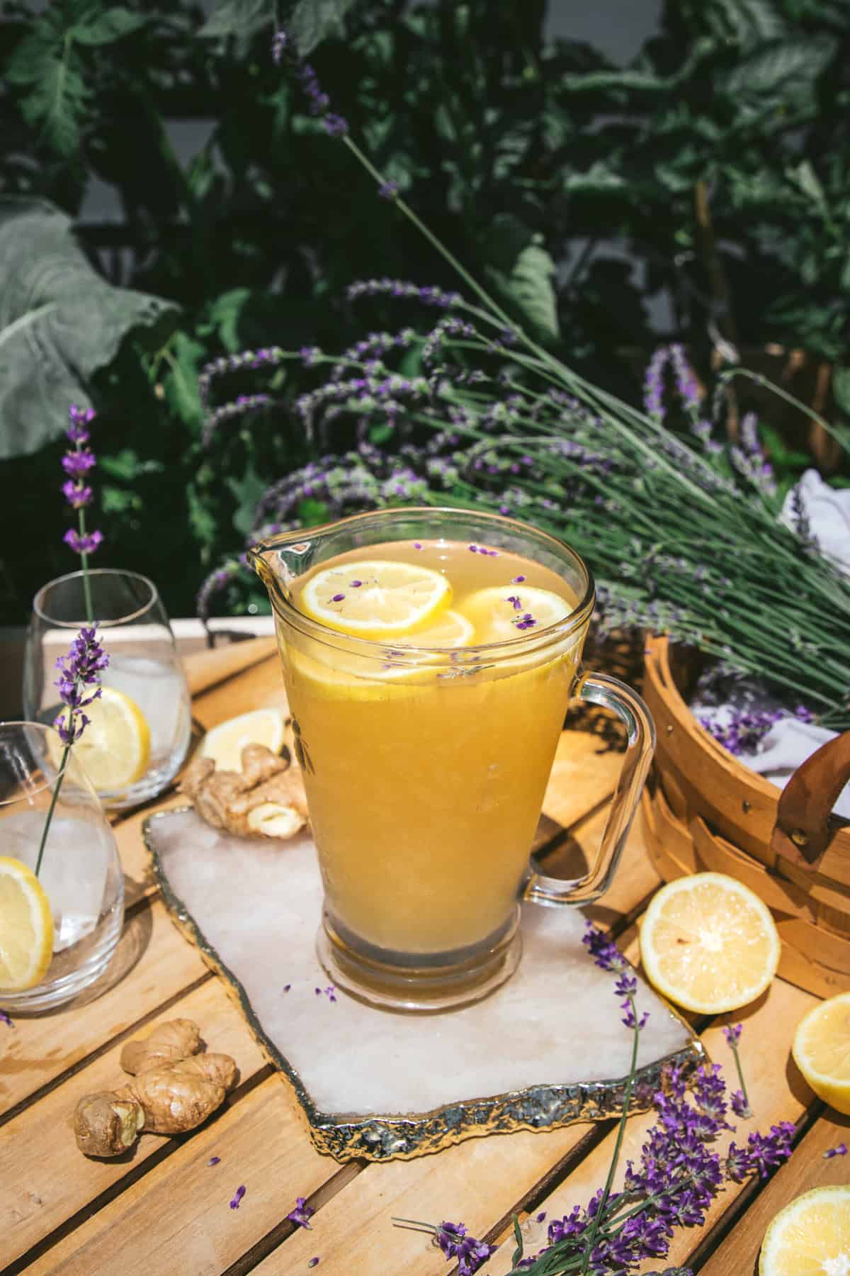 pitcher of lavender ginger lemonade on a bistro table